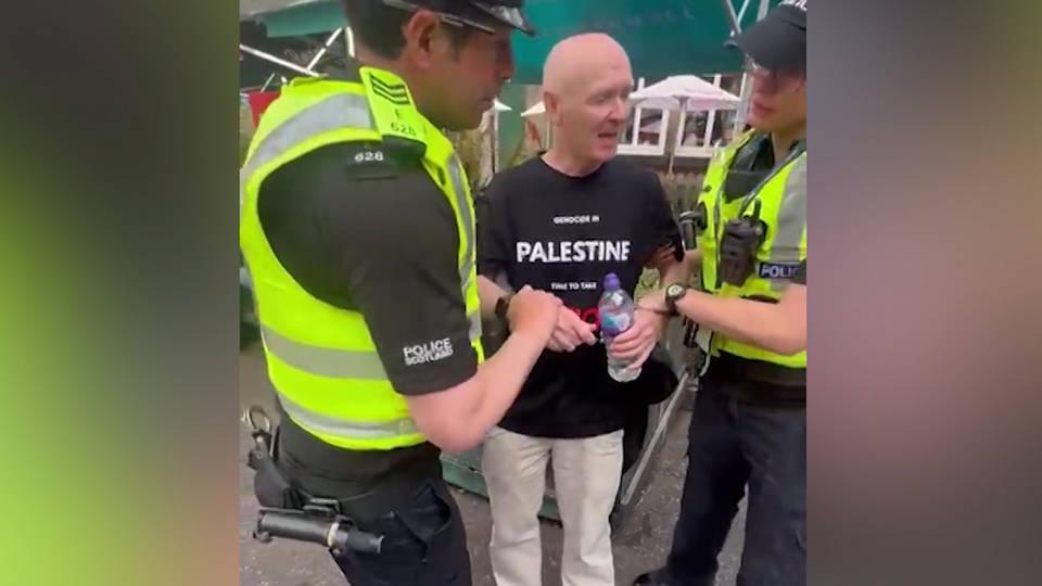 Screenwriter Paul Laverty is arrested wearing a Palestine Action T-shirt